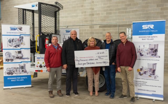 Sherman+Reilly presents a donation to the Chattanooga Area Food Bank